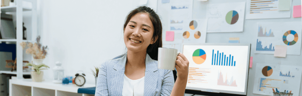 smshost.co.uk  person-holding-mug-in-office-setting